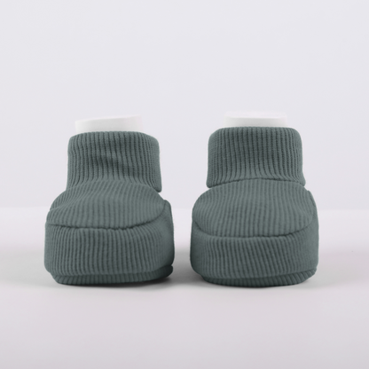 Organic cotton baby booties in green designed for newborn comfort