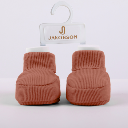 Organic cotton baby booties in bronze designed for newborn comfort