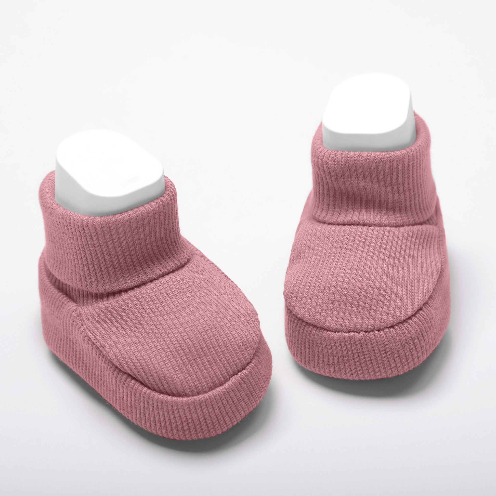 Organic cotton baby booties in rose designed for newborn comfort