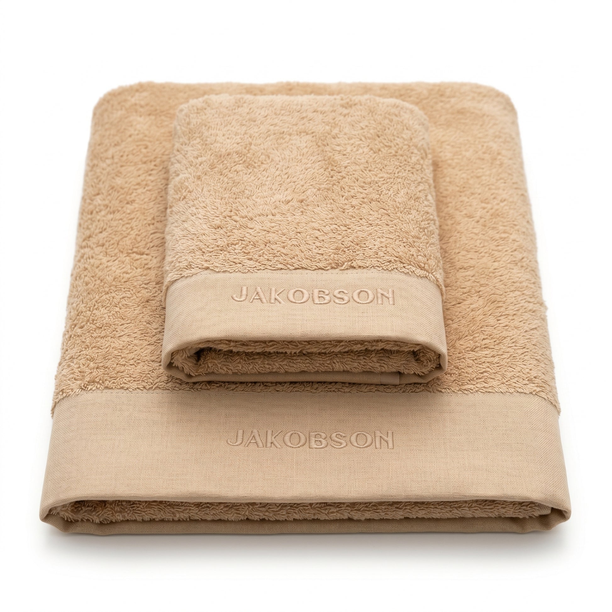 2-piece organic cotton towel set in beige with Jakobson branding made from 100% organic cotton
