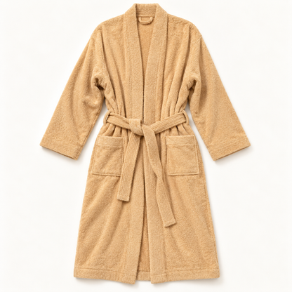 A classic tan terry cloth beige bathrobe with a matching tie belt and front patch pockets, laid flat against a clean white background.